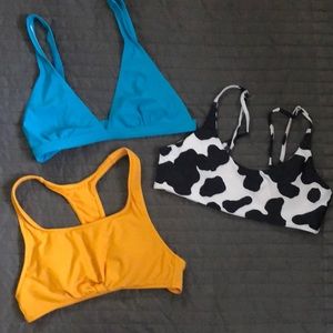 Lot of swimsuit tips. Sz small. Cow print, Teri and athletic style.